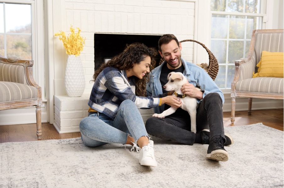 a young couple with dog